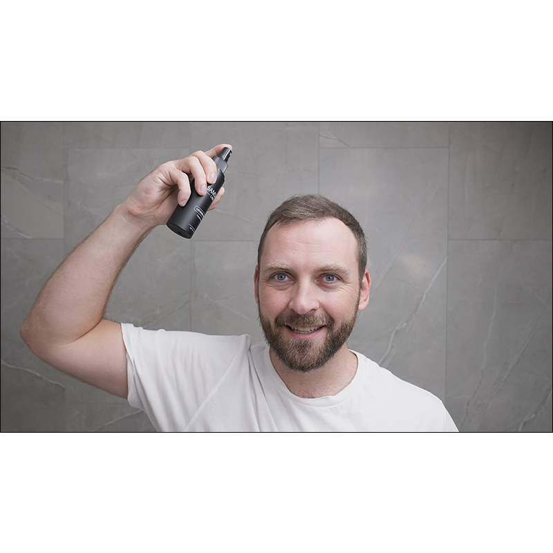 Samson Labs Locking Spray bottle for hair styling and all day hold product in use frontal